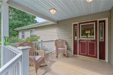 This welcoming porch has vinyl railings for easy m