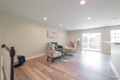 Living area featuring new LVP flooring, healthy am