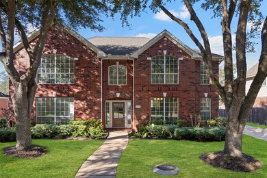 Beautiful brick home with mature landscaping