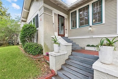 Perched upon a elevated front yard, 1338 Fern St.