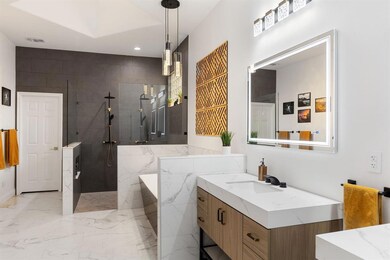 You won't believe this owner's suite bathroom. Everything is new including the double vanities.