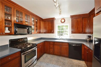 Custom cabinetry with abundance of storage/counter