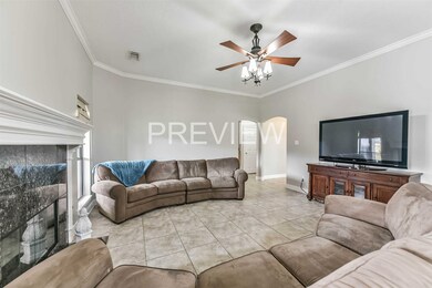 liveing room looking towards the entry hall, garage, stairs to upper bedroom/media room/gameroom