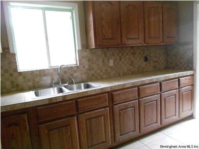 Kitchen with new tile floors and countertops