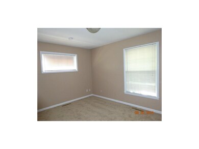 Master bedroom, new carpet and window coverings.