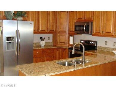Kitchen - The kitchen has granite countertops,  ce