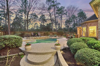 Custom landscaping and unique architectural details in this private and sprawling backyard.
