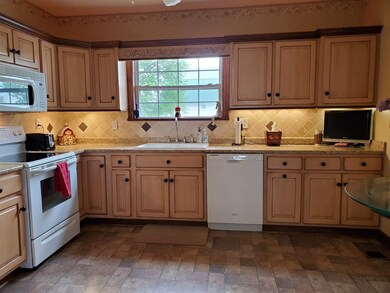 Features custom Grabil cabinetry