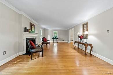 The Spacious Living Room is accentuated with Hardw