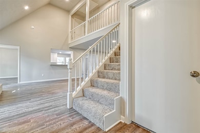 Enjoy being greeted by elegant vaulted ceilings