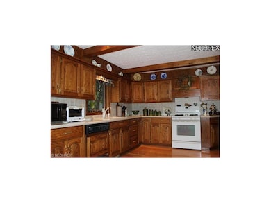 The kitchen is awesome with beamed ceiling, gorgeo