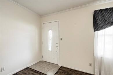 Newer front door, tile entry