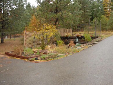 Paved Drive and Landscape Features