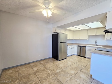 Kitchen featuring appliances with stainless steel