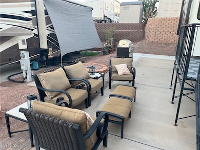 View of patio featuring a grill