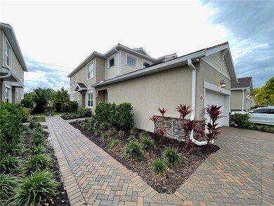 View of property exterior with a garage