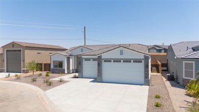 View of front of house featuring a garage and cent