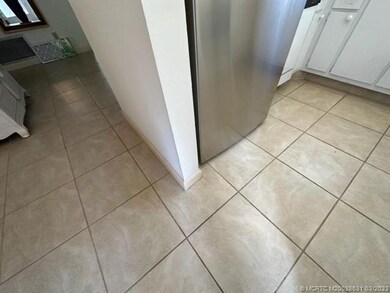 Tile Flooring in Kitchen, Dining, hall and baths