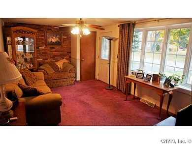Living Room. Huge bay window (new) for tons of lig