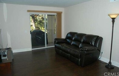 Large Living Room with Beautiful Wood Flooring and