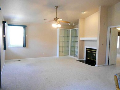 Living Room. Glass built in, thermostat controlled double sided gas log fireplace, new paint