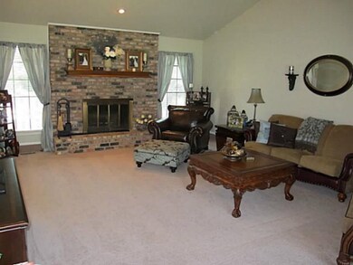 Living Room. This photo shows the large windows on