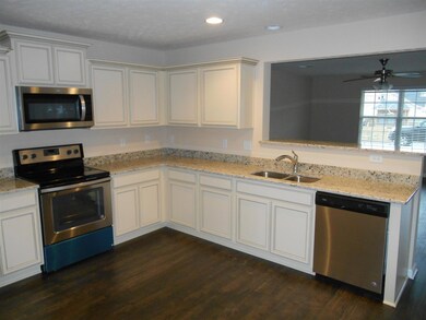 kitchen sink looks into the great room