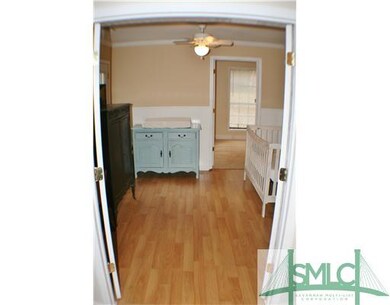 Bedroom. Bedroom off of the kitchen, can also be u