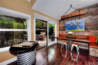 Dining Room With Sliders Opening To The Backyard f