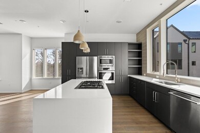 Kitchen featuring appliances with stainless steel