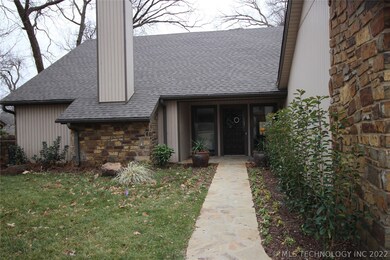 PROFESSIONALLY LANDSCAPED IN FRONT WITH NEWLY INST