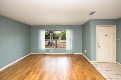 LIVING ROOM AND FOYER