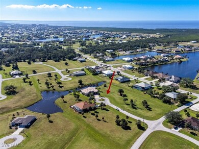 View of property location with a large body of water