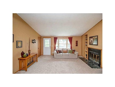 Family Room. New carpeting, fresh paint, wood burn