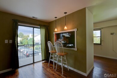 Kitchen Breakfast Area Opens to Private Balcony.
