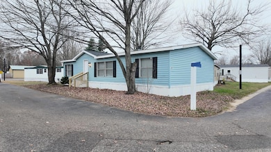 1281 E Pontaluna Rd unit 28, Norton Shores, MI 49456 - photo 2