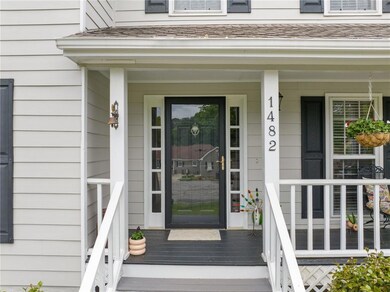 Property entrance with a porch