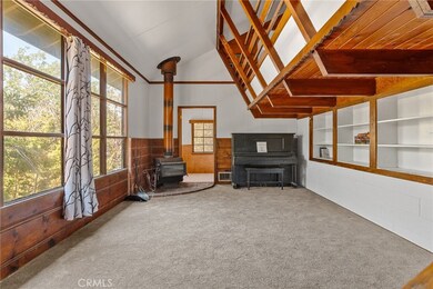 Downstairs living room with wood burning stove.