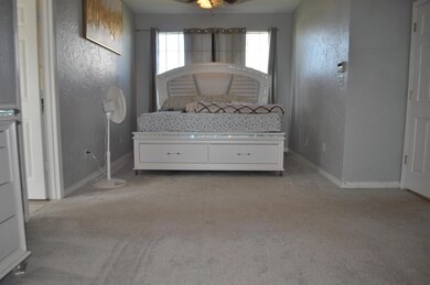 Unfurnished bedroom with carpet flooring and ceili