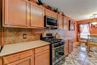 Take a look at these immaculate kitchen cabinets with granite countertops