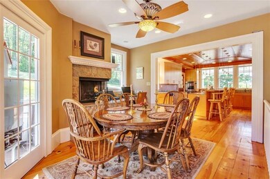 Lovely Eat-in-kitchen with gas fireplace and view 
