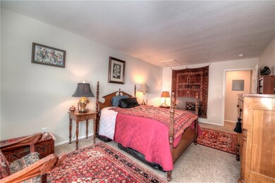 Large master bedroom with plenty of room for a kin