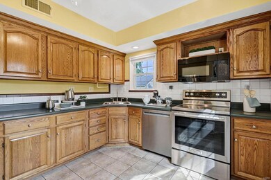 Eat-in Kitchen equipped with Stainless appliances.  