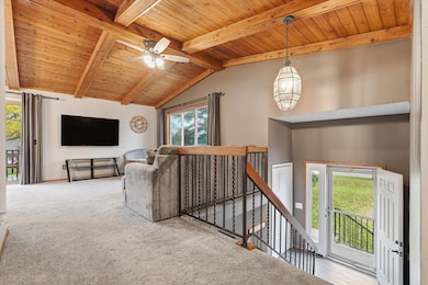 You will LOVE the vaulted wood beamed cieling!