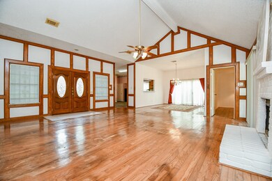 To right of the front doors is the entrance to the