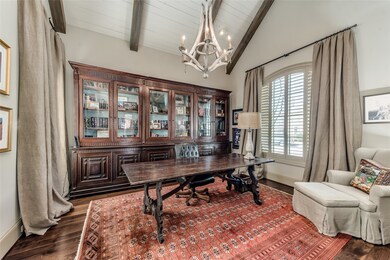 Study with walnut floors and vaulted ceiling.  Lar