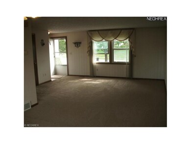 Living room with carpet just installed on Septembe