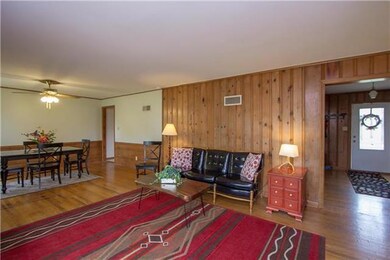 Looking to front door.  No popcorn ceilings in thi