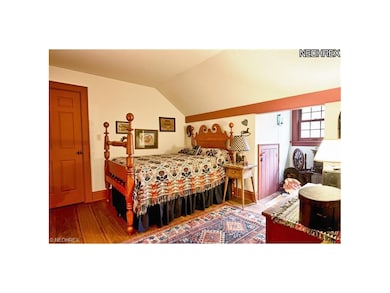 upstairs bedroom with extra storage.