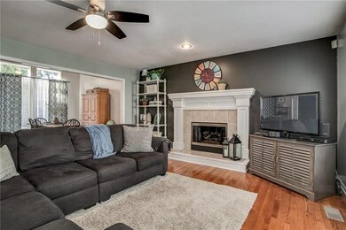 The hardwood floors flow into to the family with a